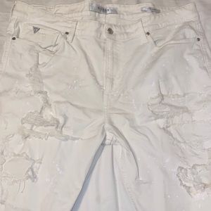 Guess slim shorts, back right pocket has a stain.